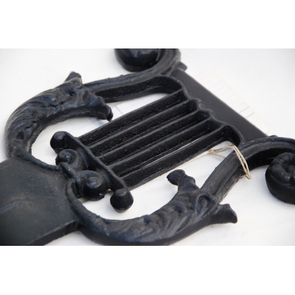  Essuie-pieds "Lyre" en fonte noir sur  Moinat SA  - Antiquités décoration