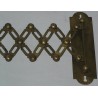 Extendable wall light, made of brass. Available from  Moinat SA  - Antiques and home décor