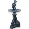  Fontaine "Chérubin" en fonte noire sur  Moinat SA  - Antiquités décoration