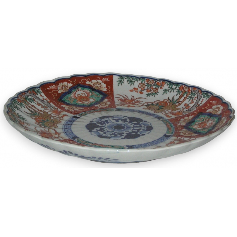 Plat Imari décor de lions, en