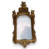  Miroir italien en bois sculpté et doré sur  Moinat SA  - Antiquités décoration