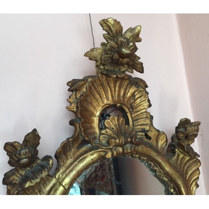  Miroir italien en bois sculpté et doré sur  Moinat SA  - Antiquités décoration