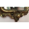  Miroir italien en bois sculpté et doré sur  Moinat SA  - Antiquités décoration