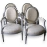 Set of 4 Louis XVI armchairs with medallion motifs. Available from Moinat SA – Antiques and home décor