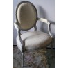 Set of 4 Louis XVI armchairs with medallion motifs. Available from Moinat SA – Antiques and home décor