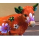 Petite vache en résine orange brillant