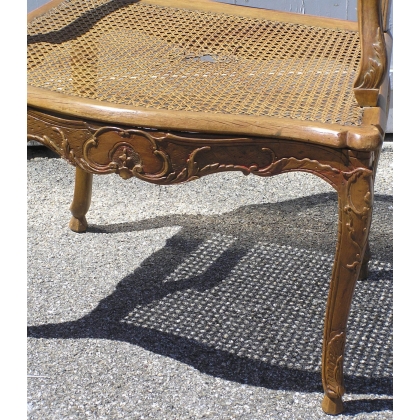 Pair of cane armchairs with cane seats and backs by  Moinat SA  - Antiques and interior design