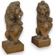 Paire de sculptures "Lions" sur socle,