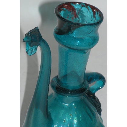  Aiguière, en verre soufflé vert. Iran. sur  Moinat SA  - Antiquités décoration