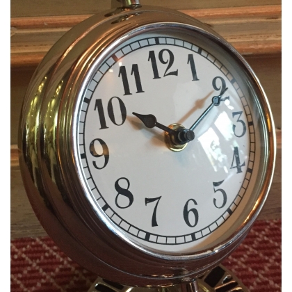 Round aluminium desk clock at  Moinat SA  - Antiques and home décor