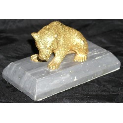 "Bear" sculpture on a grey marble plinth. At Moinat SA – Antiques and Decor