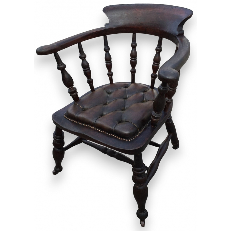 Armchair on castors, made of beech. Available from  Moinat SA  - Antiques and home décor