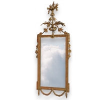 Miroir Louis XVI, en bois doré décapé.