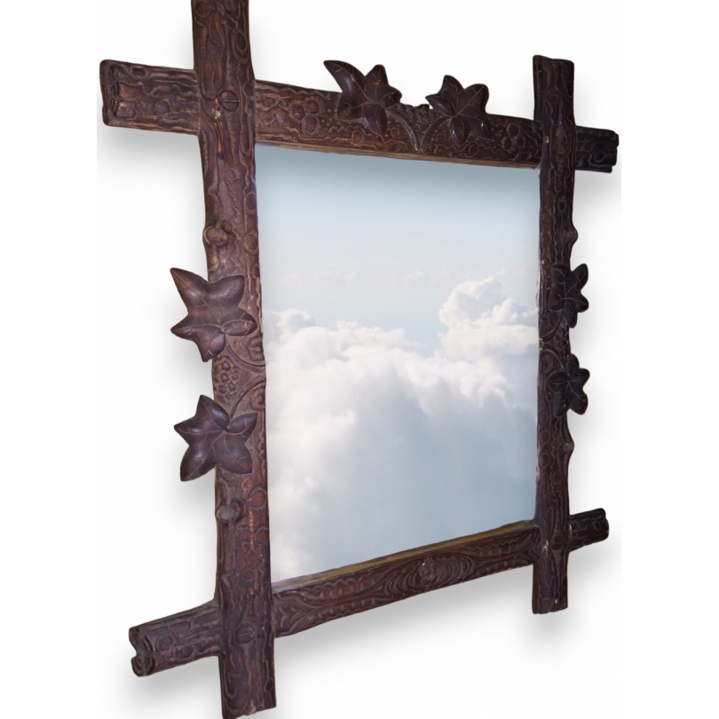  Miroir de Brienz, en bois sculpté. sur  Moinat SA  - Antiquités décoration