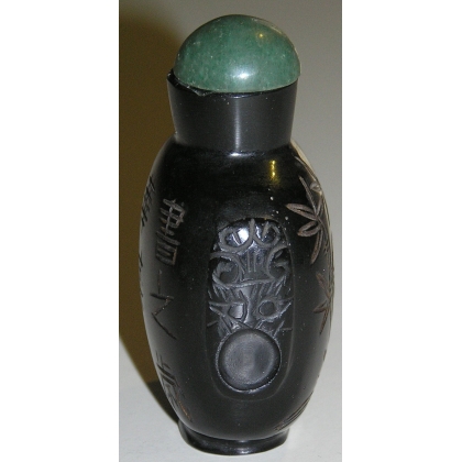 Snuff box, made of engraved black glass. China. Available at  Moinat SA  - Antiques and decorative items