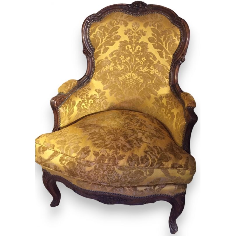 Bergère Louis XV, en noyer. Couverte