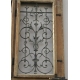 Entrance door decorated with wrought iron.