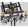 Wrought-iron candlestick. With 2 candles. At  Moinat SA  – Antiques and home décor