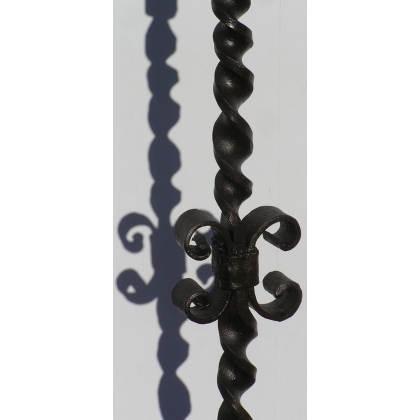 Wrought-iron candlestick. With 2 candles. At  Moinat SA  – Antiques and home décor