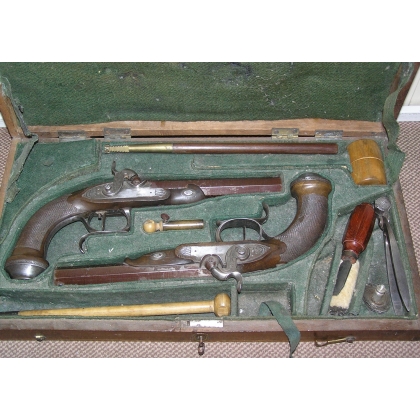 Pair of flintlock pistols with accessories at  Moinat SA  - Antiques and home décor