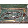 Pair of flintlock pistols with accessories at  Moinat SA  - Antiques and home décor