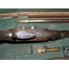 Pair of flintlock pistols with accessories at  Moinat SA  - Antiques and home décor