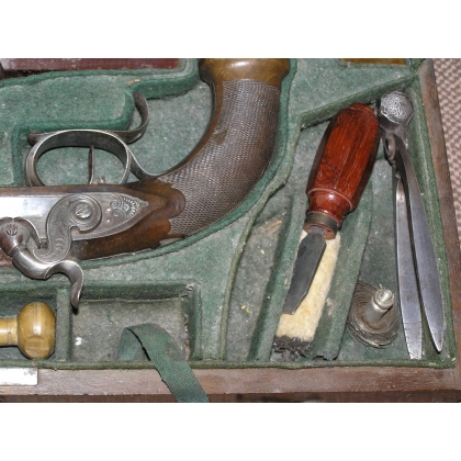 Pair of flintlock pistols with accessories at  Moinat SA  - Antiques and home décor