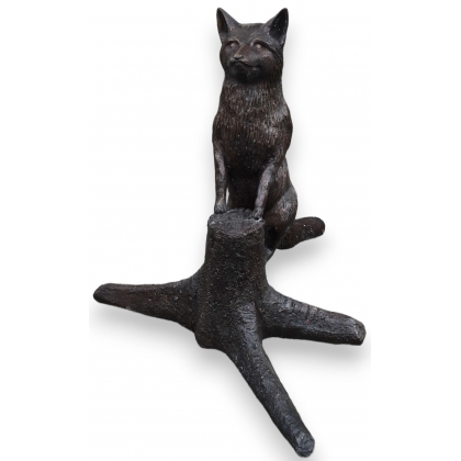 Renard sur une souche en bronze