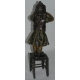 Sculpture "Jeune fille debout sur un tabouret"
