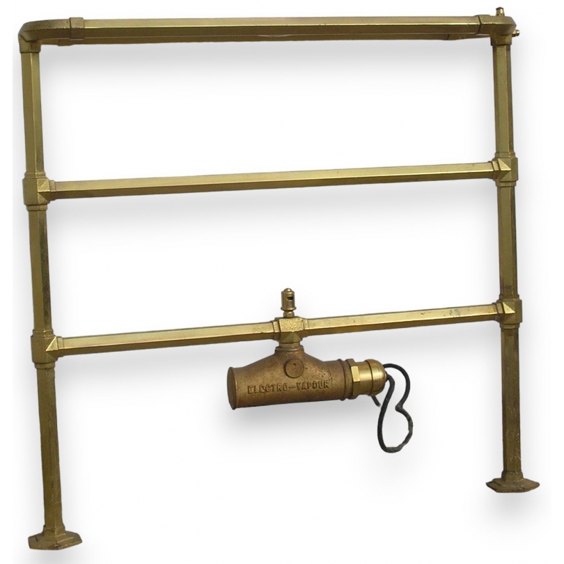 Radiator, gold-coloured steel tumble dryer at  Moinat SA  - Antiques and home décor