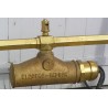 Radiator, gold-coloured steel tumble dryer at  Moinat SA  - Antiques and home décor