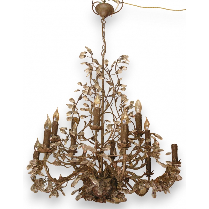 12-light brass chandelier. Available from  Moinat SA  - Antiques and home décor