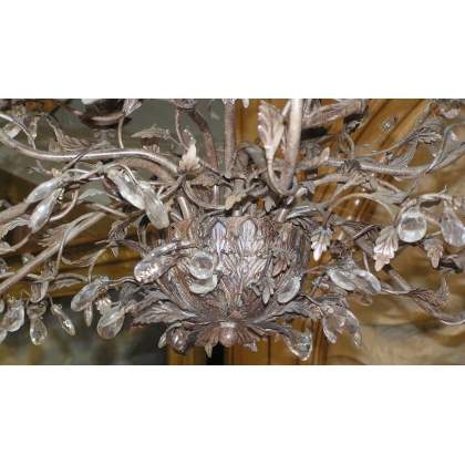 12-light brass chandelier. Available from  Moinat SA  - Antiques and home décor