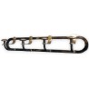 Coat rack with 4 brass hooks at  Moinat SA  - Antiques and home décor
