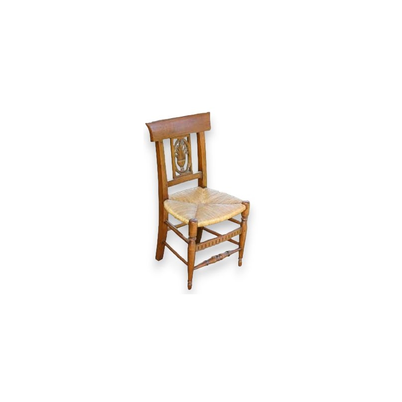 Children’s chair with straw seat and carved backrest. From  Moinat SA  – Antiques and home décor