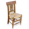 Children’s chair with straw seat and carved backrest. From  Moinat SA  – Antiques and home décor