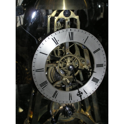 "Squelette" clock, in brass and steel, at  Moinat SA  - Antiques and home décor