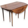  Table 6 pieds sur roulettes. sur  Moinat SA  - Antiquités décoration