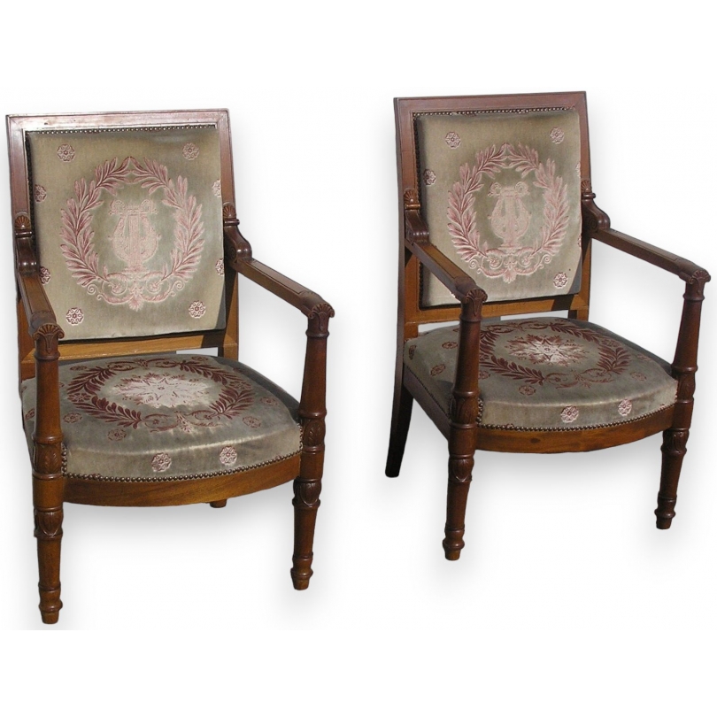 A pair of Empire-style armchairs, in mahogany. From  Moinat SA  - Antiques and home décor
