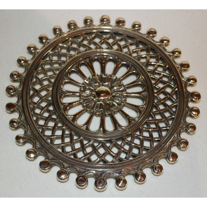 Round polished brass trivet from  Moinat SA  - Antiques and home décor