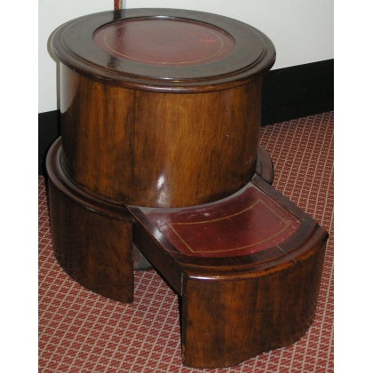 Round mahogany chest of drawers. From  Moinat SA  - Antiques and home décor