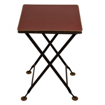 Table pliante en tôle rouge et filet or sur  Moinat SA  - Antiquités décoration