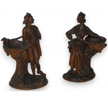 Paire de sculptures figurines "Femme et