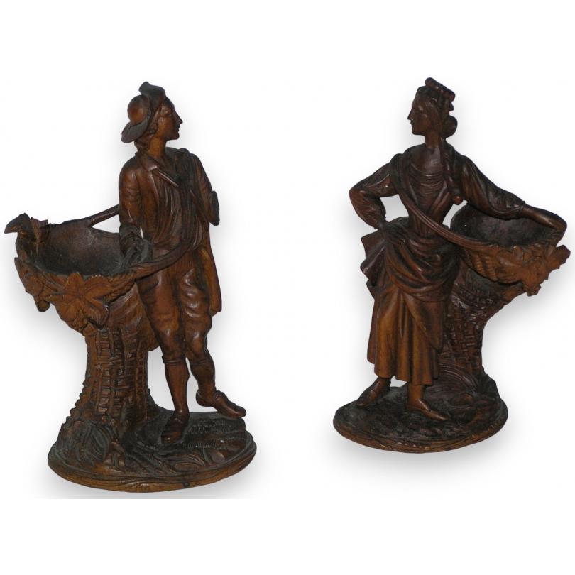 Paire de sculptures figurines "Femme et