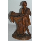 Paire de sculptures figurines "Femme et