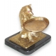 Gilt bronze bear holding a tray on black base.