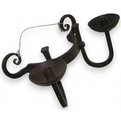 Two-light wall light, made of wrought iron. From  Moinat SA  - Antiques and home décor