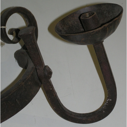 Two-light wall light, made of wrought iron. From  Moinat SA  - Antiques and home décor