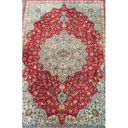  Tapis Keshan avec médaillon central sur  Moinat SA  - Antiquités décoration