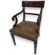Paire de fauteuils, en acajou. Assise en cuir brun